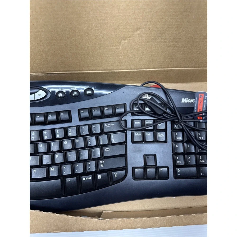 Microsoft Comfort Curve Keyboard 2000 Ergonomic Wired USB Black Model 1047